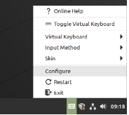 Select the keyboard icon in the task bar and then select 